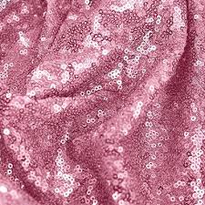 Sequin fabric is a type of textile embellished with small, shiny discs, known as sequins, which are often made from plastic or metal.
