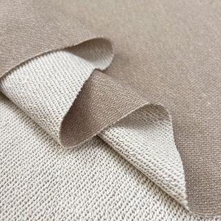 Terry fabric is a type of textile characterized by its looped pile surface, which is created by weaving extra threads into the fabric.